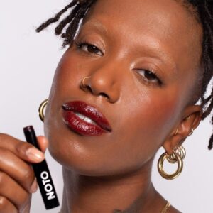 NOTO Botanics Genet Multi-Bene Stick is a vegan lip and cheek stain with a deep, rich berry hue.