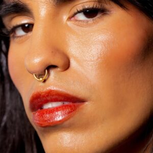 NOTO Multi-Bene Stick in shade Oscillate has a beautiful buildable popsicle red hue for lips and cheeks.