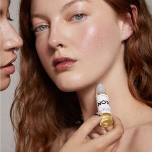 Shop NOTO Rooted Oil Roller, a deep yet subtle scent of palo santo for hair and skin.