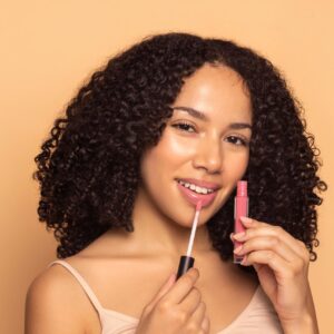 TOK Lip Tonic in shade Heart, a moisturizing, non-sticky lip gloss with a bright pink hue.