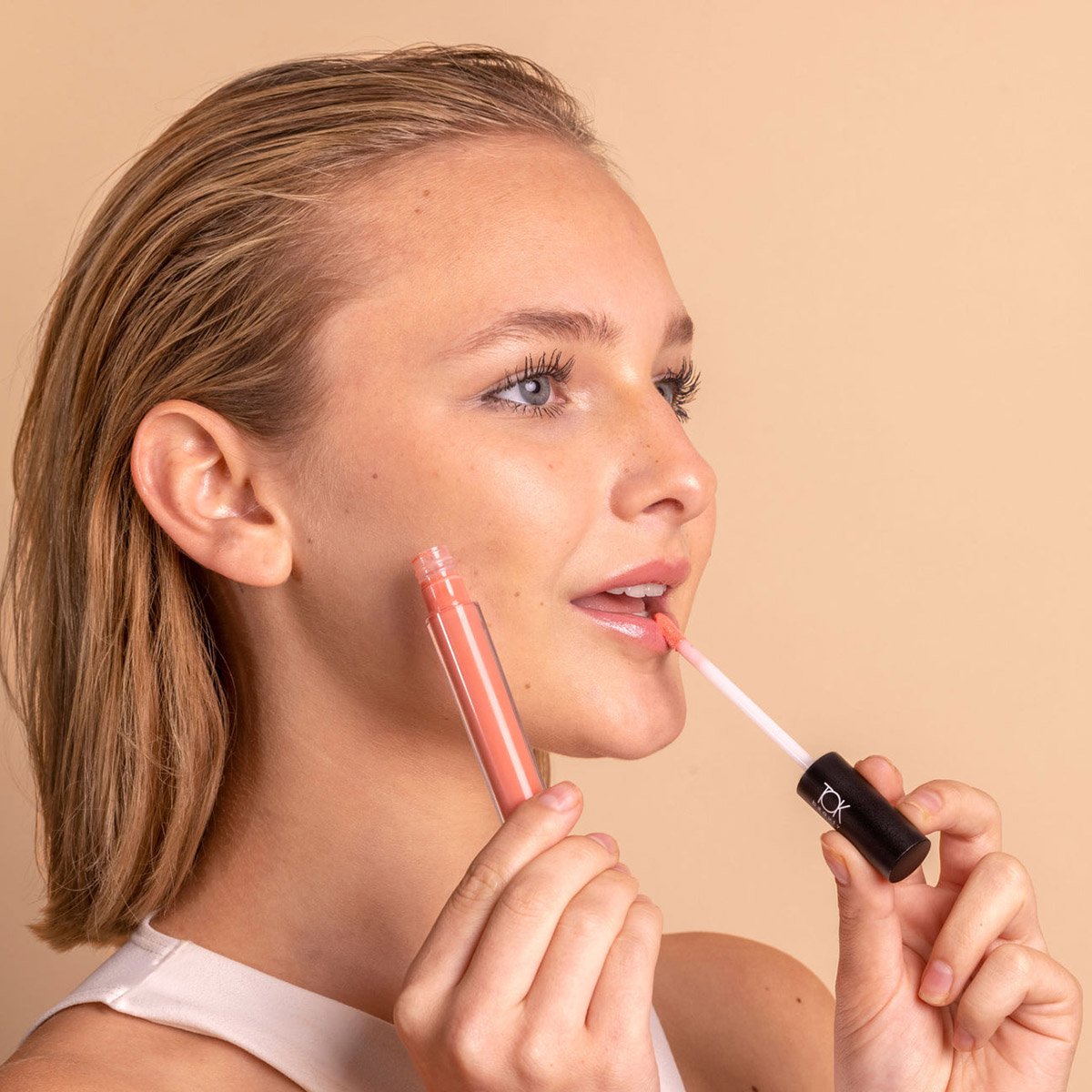 Shop Tok Beauty Lip Tonic lip gloss in shade Bloom at Inspire Beauty.