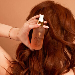 Rahua Salt Spray hair styler enhances volume and texture creating perfect beach waves.
