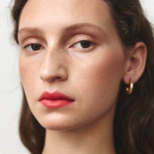 Manasi 7 All Over Colour Ikura is dabbed gently on the lips for a fresh look.