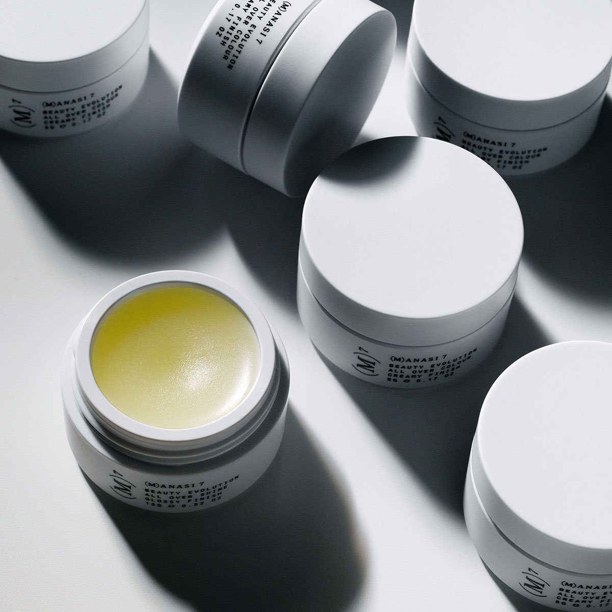 Manasi 7 Cristallo All Over Shine is an organic all-in-one lip, face and eye balm with a subtle glossy finish.