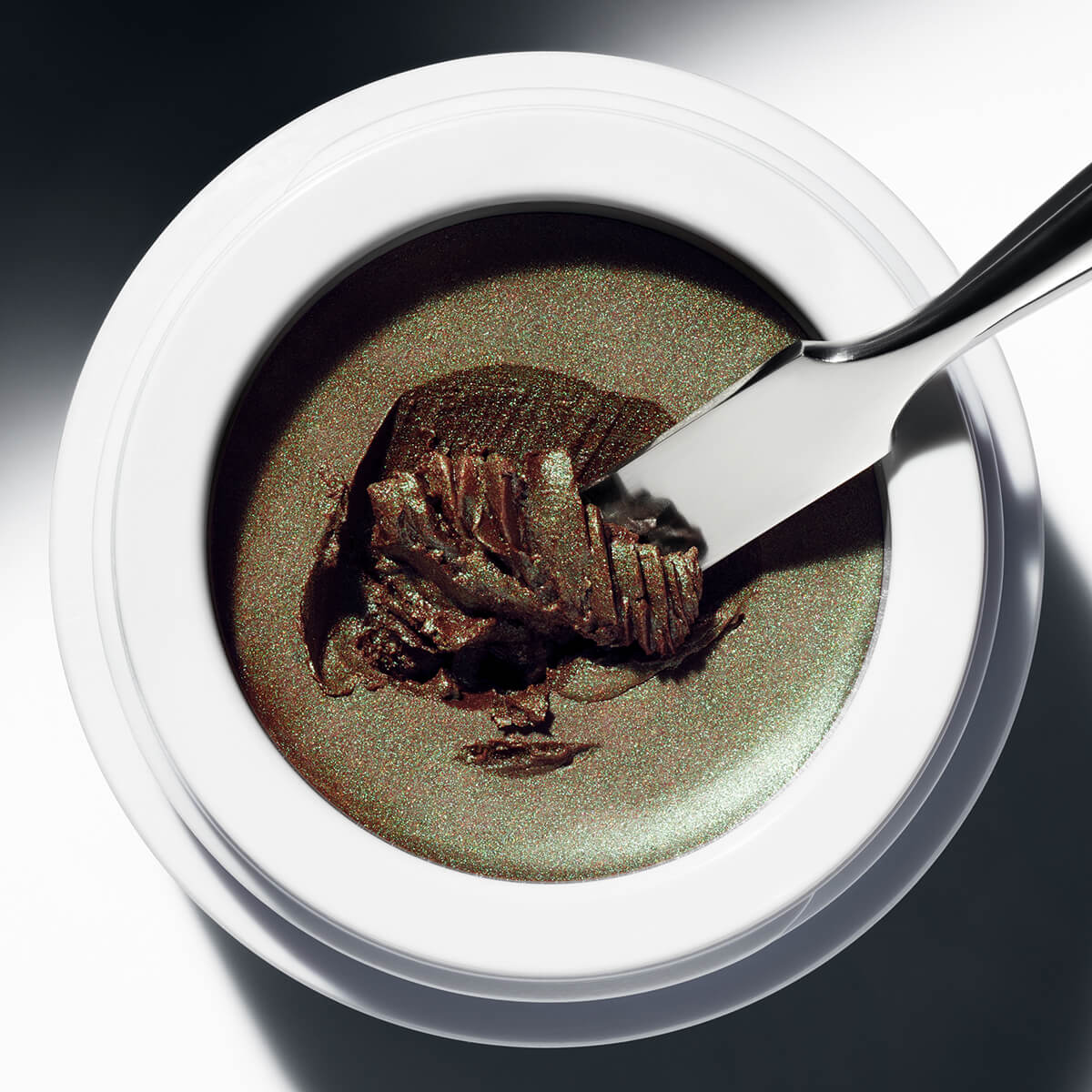 Shop Manasi 7 Eye Glow Colour Ochaya at Inspire Beauty, a multi-chromatic cream eyeshadow with a lit-from-within shimmer finish.