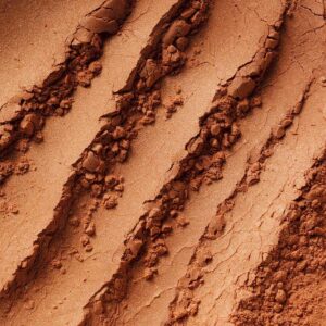 Manasi 7 Perihelion Silk Glow Powder is sheer golden peachy rose hue with a subtle shimmer.