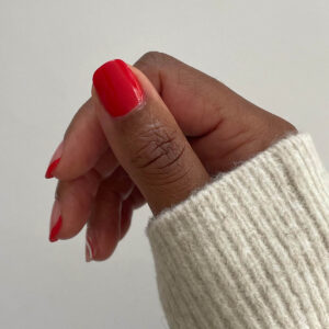 Nailberry L'Oxygéné Nail Lacquer Pop My Berry is a bright orange, nearly red opaque nail color.