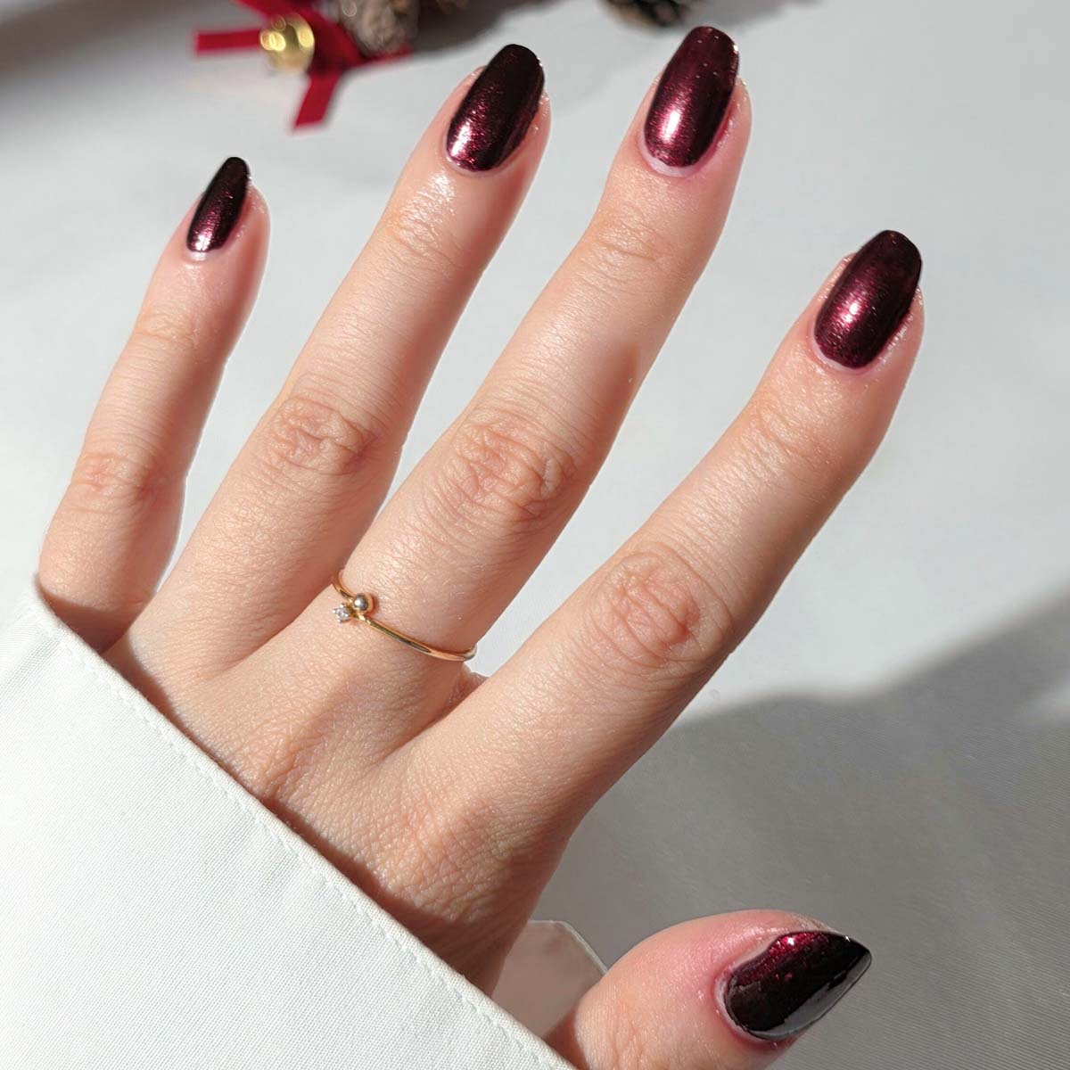 Nailberry L'Oxygéné Nail Lacquer (Very Merry Merlot) Nailberry L'Oxygéné Nail Polish Very Merry Merlot is a glazed red-black inspired by fine wine and seasonal festivities.