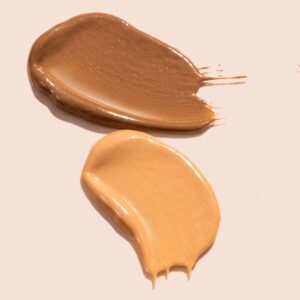 Swatches of Solara Suncare Fortune Teller Tinted Sunscreen Serum in shades MicroTint 1 and MicroTint 2