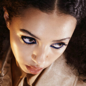 19/99 Tinted Matte Balm Terra on lips.