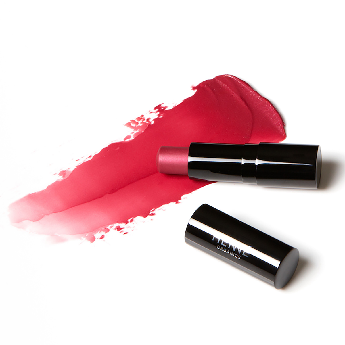 Henne Blissful Tinted Lip Balm, a buildable raspberry hue.