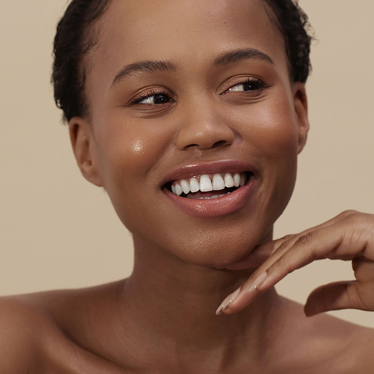 Henne Luxury Lip Tint in shade Bare, a sheer rosy nude.