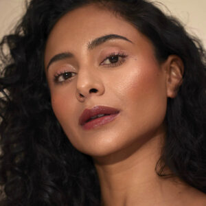 Henne Organics Luxury Lip Tint Intrigue is a classic brick red shade that looks flattering on all skin tones.