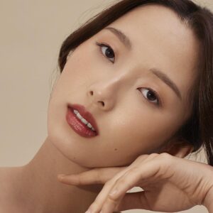 Henne Organics Luxury Lip Tint Intrigue is a classic brick red hue.