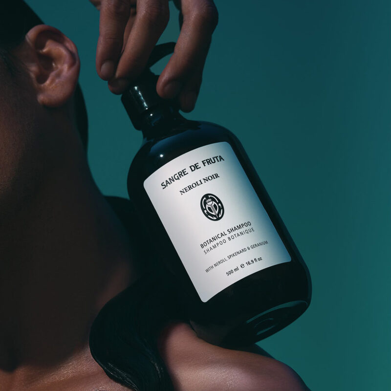 Sangre de Fruta Neroli Noir Botanical Shampoo, a handcrafted shampoo with a euphoric neroli scent.