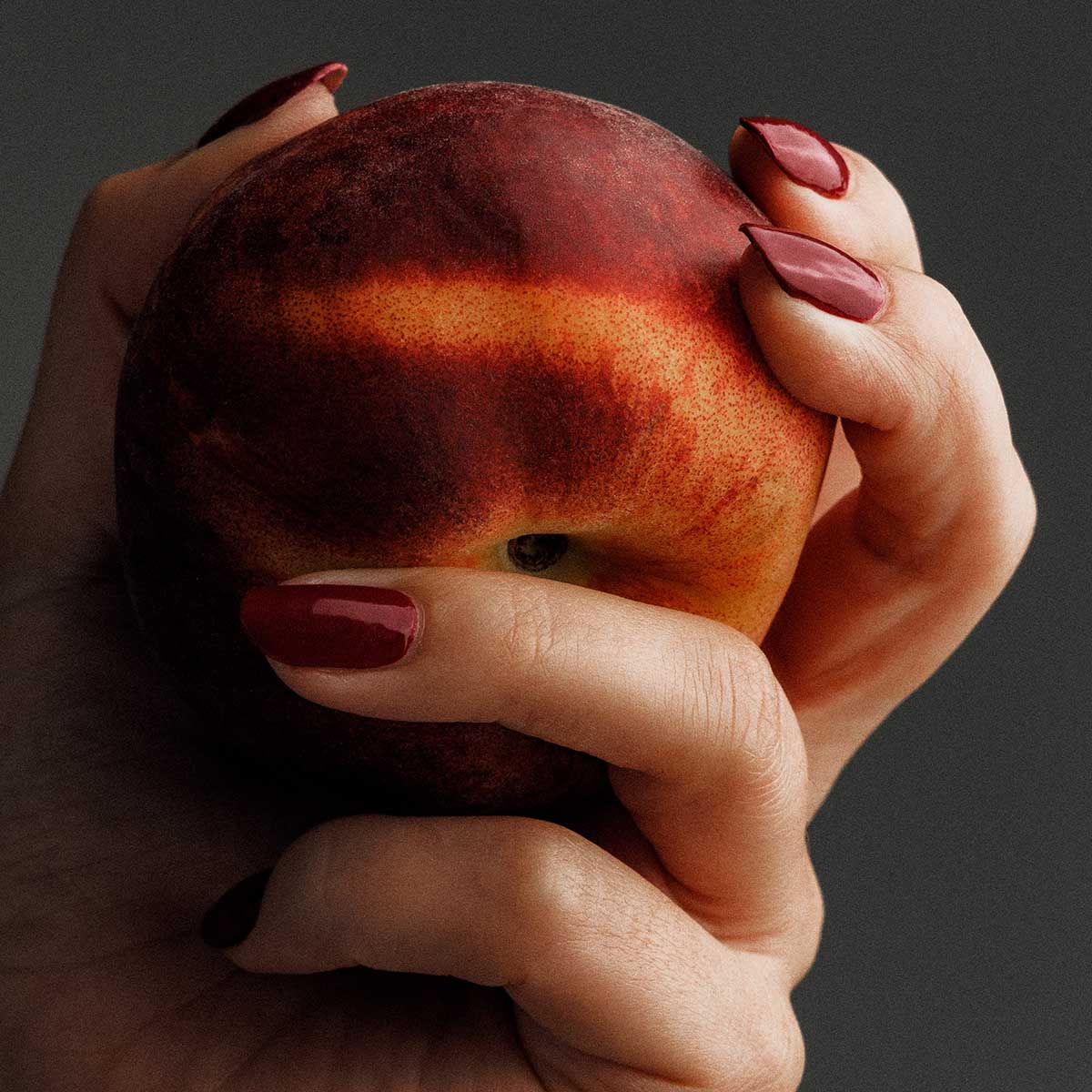 SSONE Rowan Nail Polish, a deep crimson red.