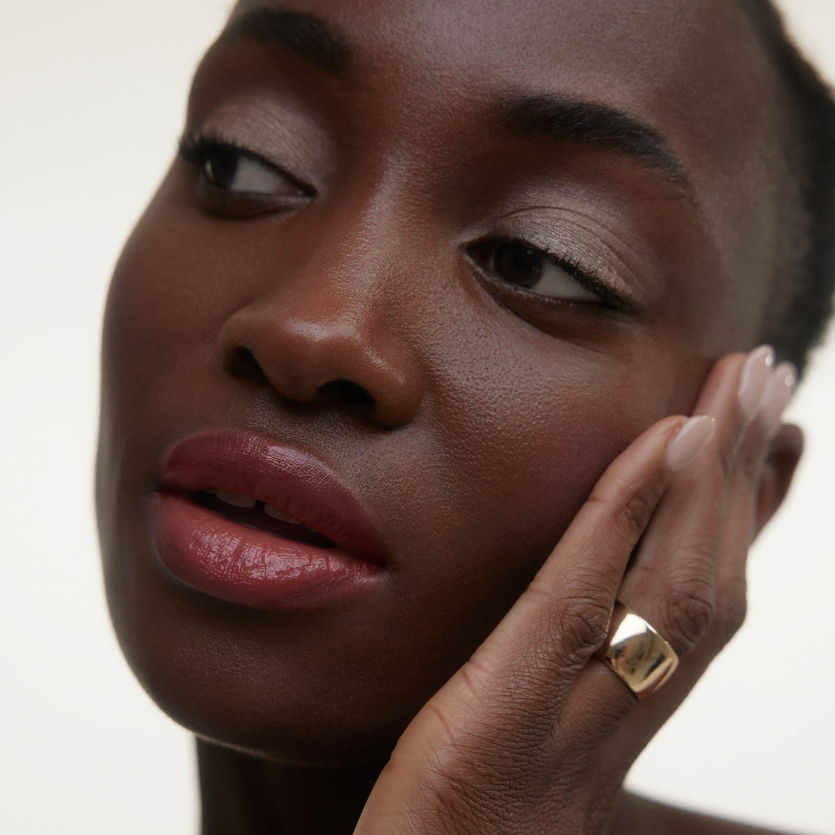 Wonderblush Le Baume Tinted Lip Balm Aurore is a buildable cherry blossom pink hue lip color.