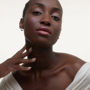 Wonderblush Bonbon Le Baume Tinted Lip Balm is a sheer, yet buildable mauvy pink that conditions lips with a beautiful pop of color.