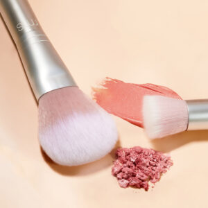 RMS BeautyPowder Blush Brush deposits the perfect amount of color to cheeks, while its flexible, light-as-air bristles make it easy to blend for a natural look.