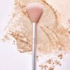RMS Skin2Skin Classic Fan Brush is the perfect makeup brush for seamlessly applying powder highlighter and sheer color.