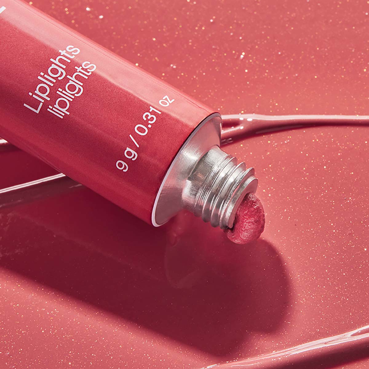 RMS Liplights Cream Lip Gloss Crush is a modern dusty pink.