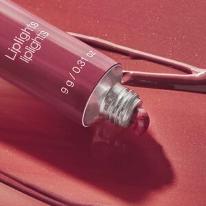 RMS Liplights Cream Lip Gloss Rumor is a dusty mauve hue.