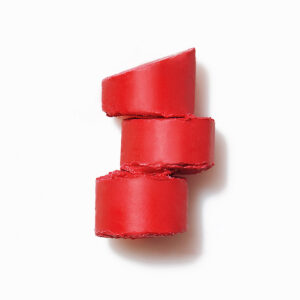 RMS Beauty Tinted Daily Lip Balm Crimson Lane is a sheer, vibrant red.