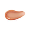 Swatch of RMS Legendary Lip Oil Amber.