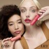RMS Legendary Lip Oil in shades Elle and Lily for high-impact shine, low-maintenance lip color.