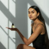 Use Om Organics Hibiscus + Daikon Seed Protective Hair Oil to add shine and a smooth, frizz-free finish.