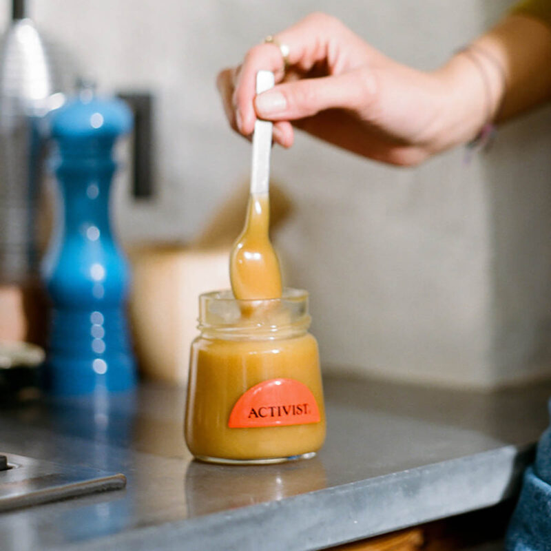 Raw Manuka Honey rich in antibacterial properties and active enzymes for proactive health and wellness.