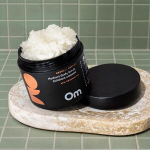 Om Organics Neroli + Pepper Radiant Body Scrub for smooth, radiant skin.