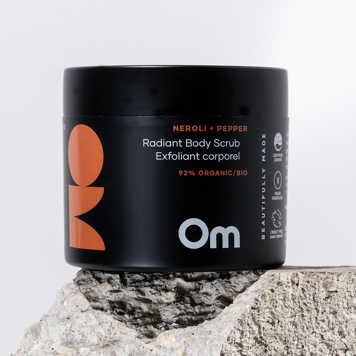 Om Organics Neroli + Pepper Radiant Body Scrub exfoliates as it softens and moisturizes skin.