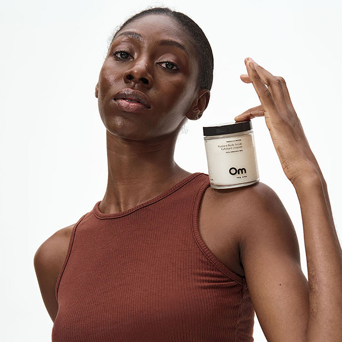 Om Organics Vanilla Moon Radiant Body Scrub exfoliates as it moisturizes, leaving skin silky smooth.