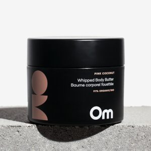 Om Organics Pink Coconut Whipped Body Butter is a deeply nourishing body cream infused with the warm scent of coconut and a hint of rose.
