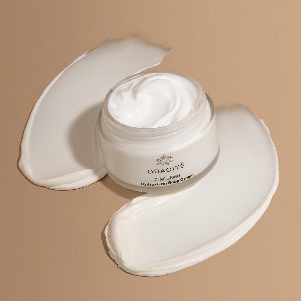 Odacite C-Nourish Hydra-Firm Body Cream is a deeply nourishing body moisturizer to firm and brighten skin.