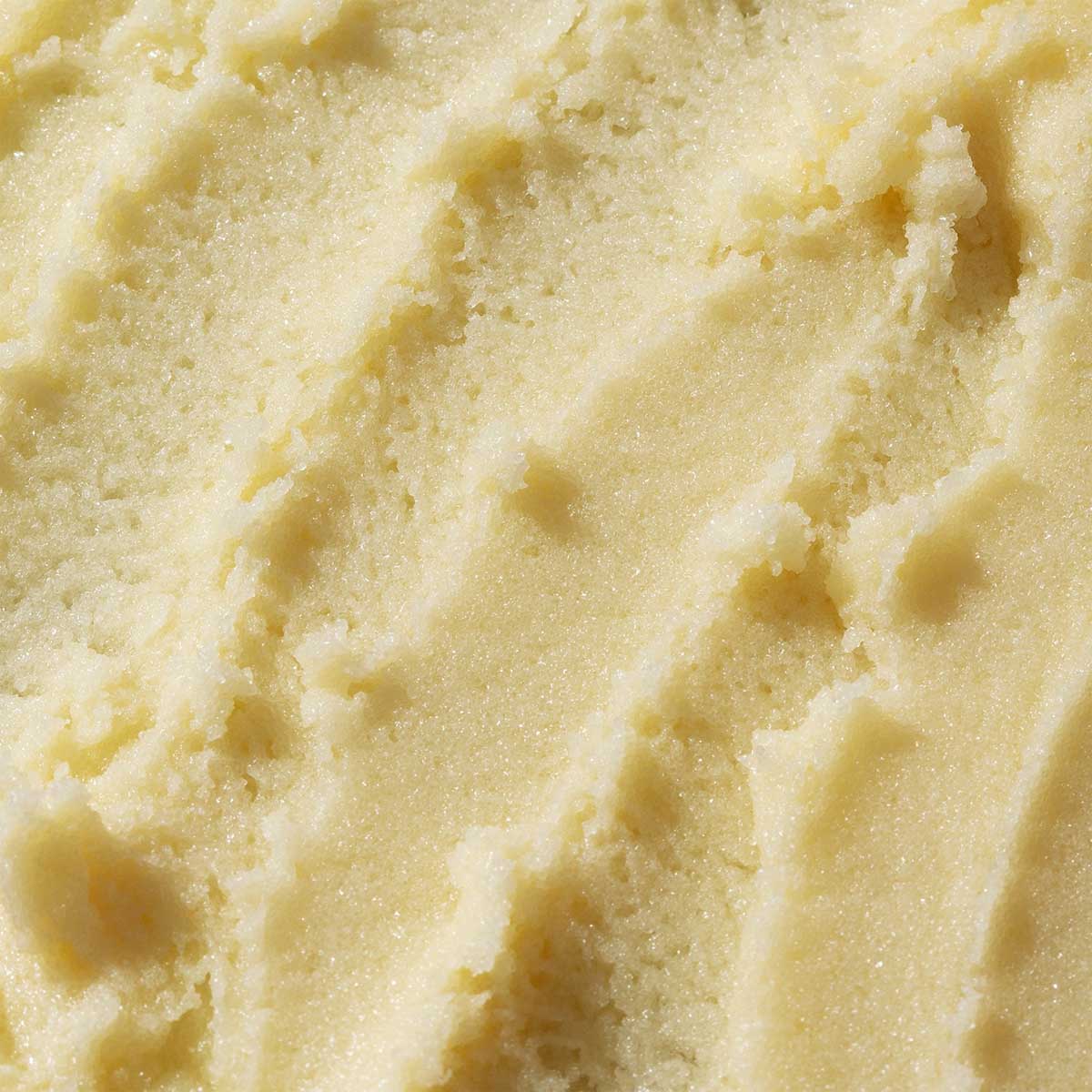 Odacité C-Smooth Hydra-Firm Body Polish buffs away build-up and dead skin revealing soft and smooth, luminous skin.