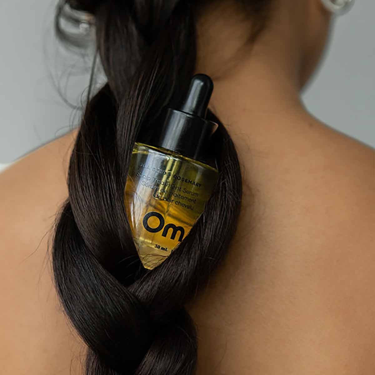 Dramatically improve the look and feel of your hair with Om Organics Amla Seed + Rosemary Scalp Treatment Serum.