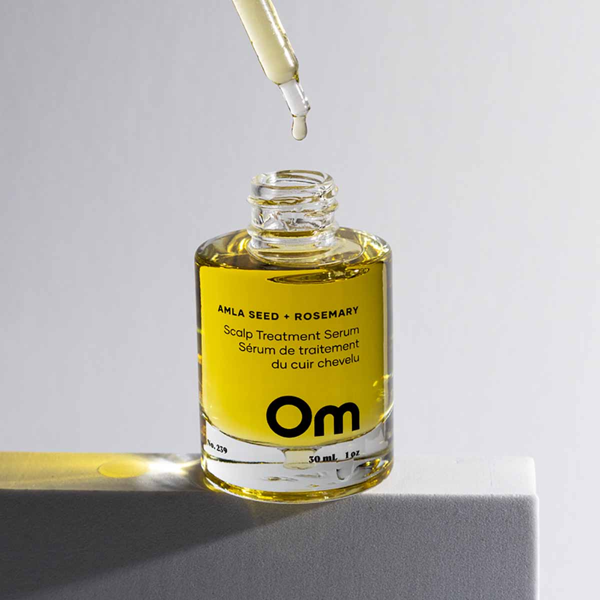 Om Organics Amla Seed + Rosemary Scalp Treatment Serum available at Inspire Beauty.