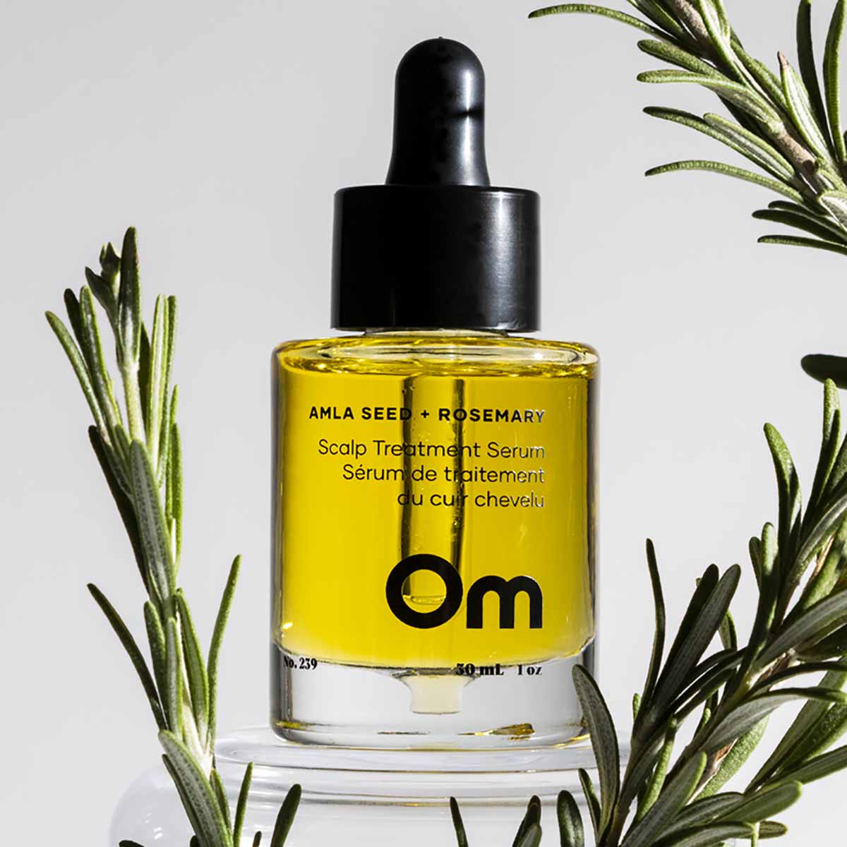 Stimulate growth, improve hair density, add moisture, and dramatically improve hair health with Om Organics Amla Seed + Rosemary Scalp Treatment Serum.