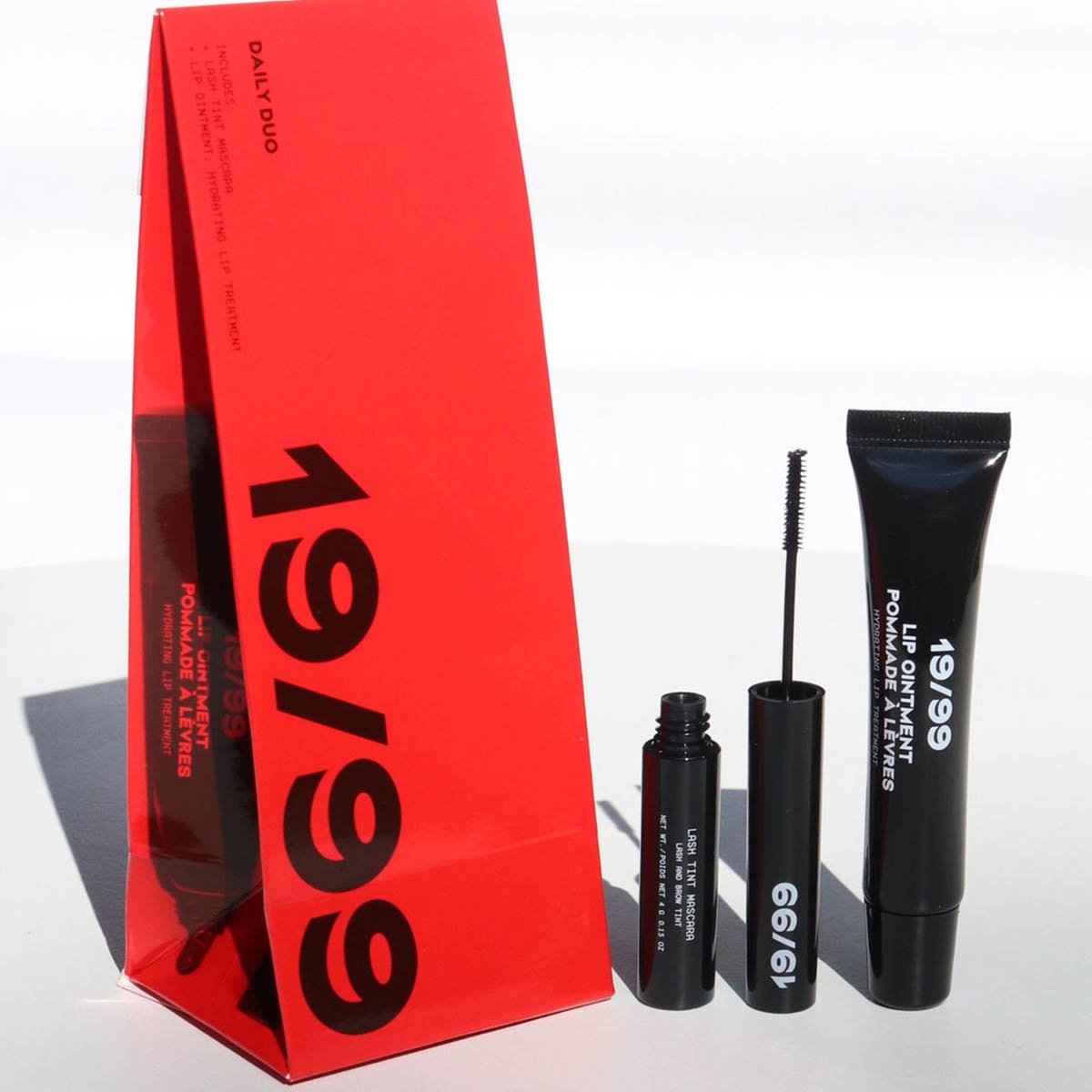 19/99 Daily Duo comes with Lip Ointment Hydrating Lip Treatment and a Black Lash Tint Mascara.