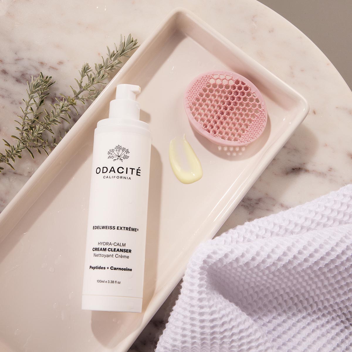 Pair Odacité Deep Cleansing Brush with Edelweiss Extreme Hydra-Calm Cream Cleanser to gently wash away dirt, makeup and impurities for clean, glowing skin.