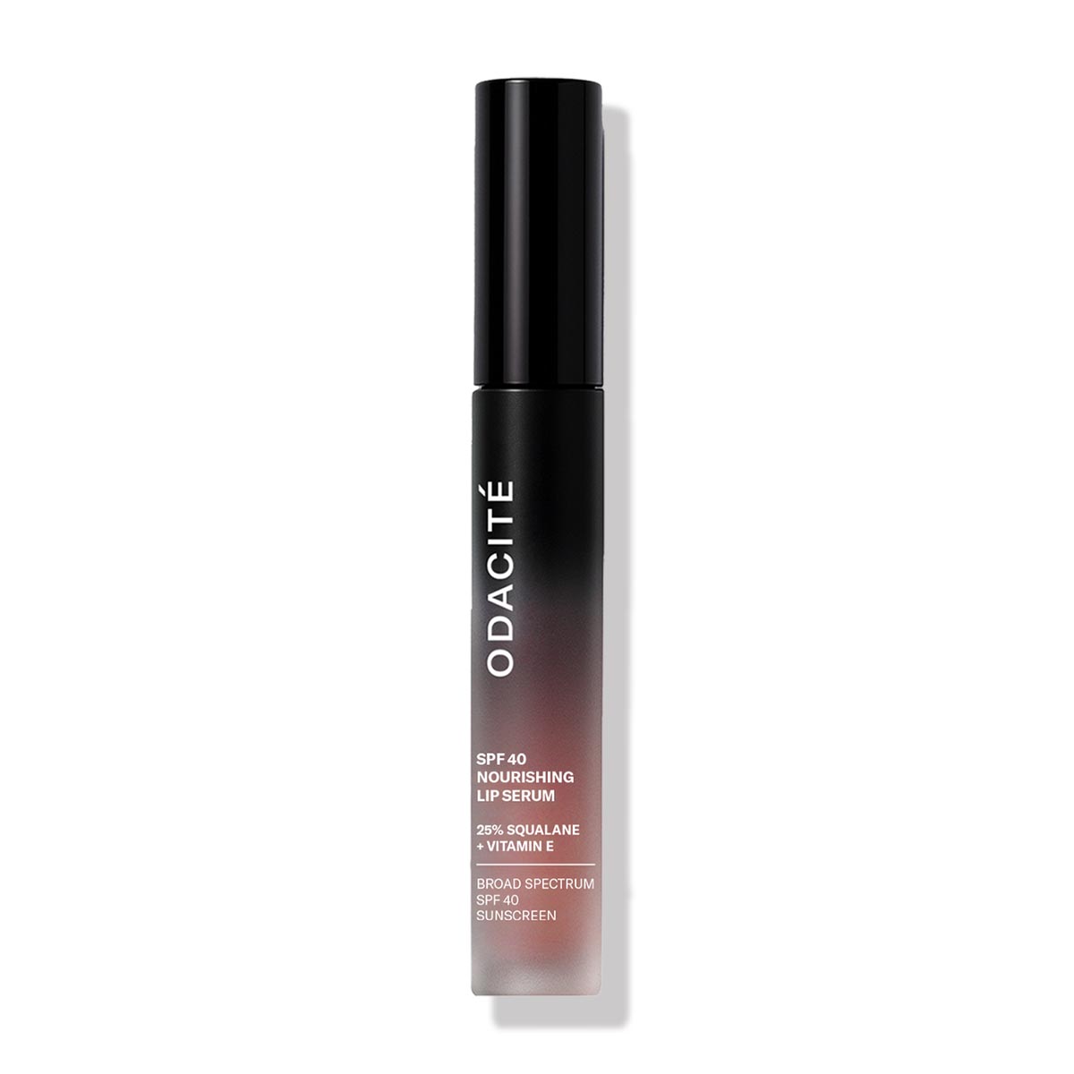 Odacité SPF 40 Nourishing Lip Serum in shade True Nude available at Inspire Beauty.